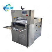 Přenosný stroj na krájení masa